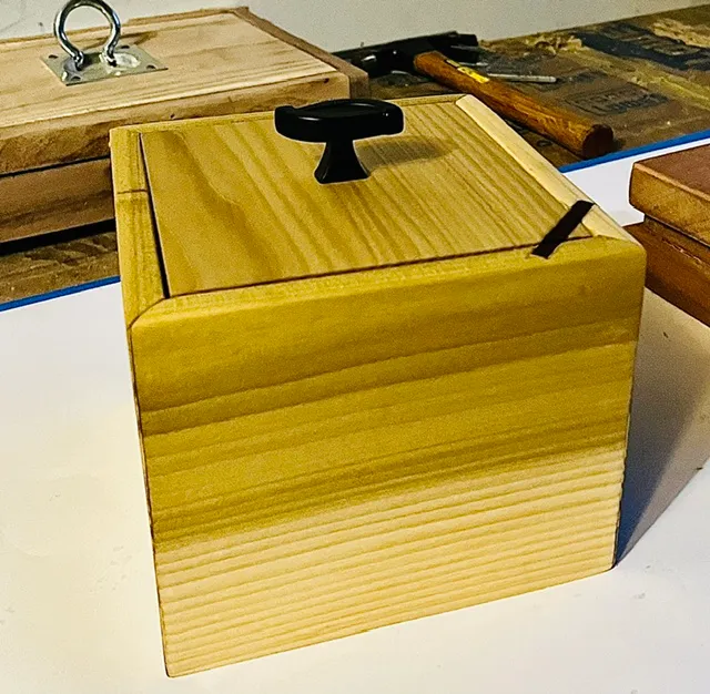 Small poplar box with black walnut detail and a turned knob