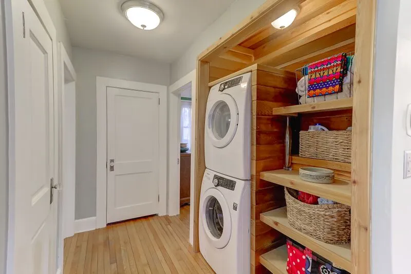 Laundry room renovation in cedar planks and birch plywood