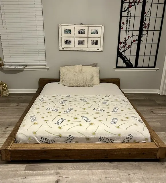 Timber bed frame built from reclaimed Charleston beams
